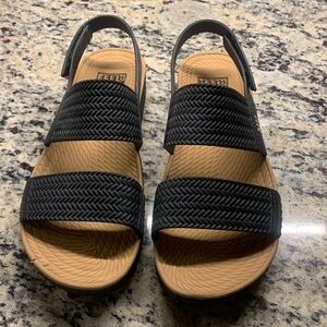 Black and tan REEF sandals